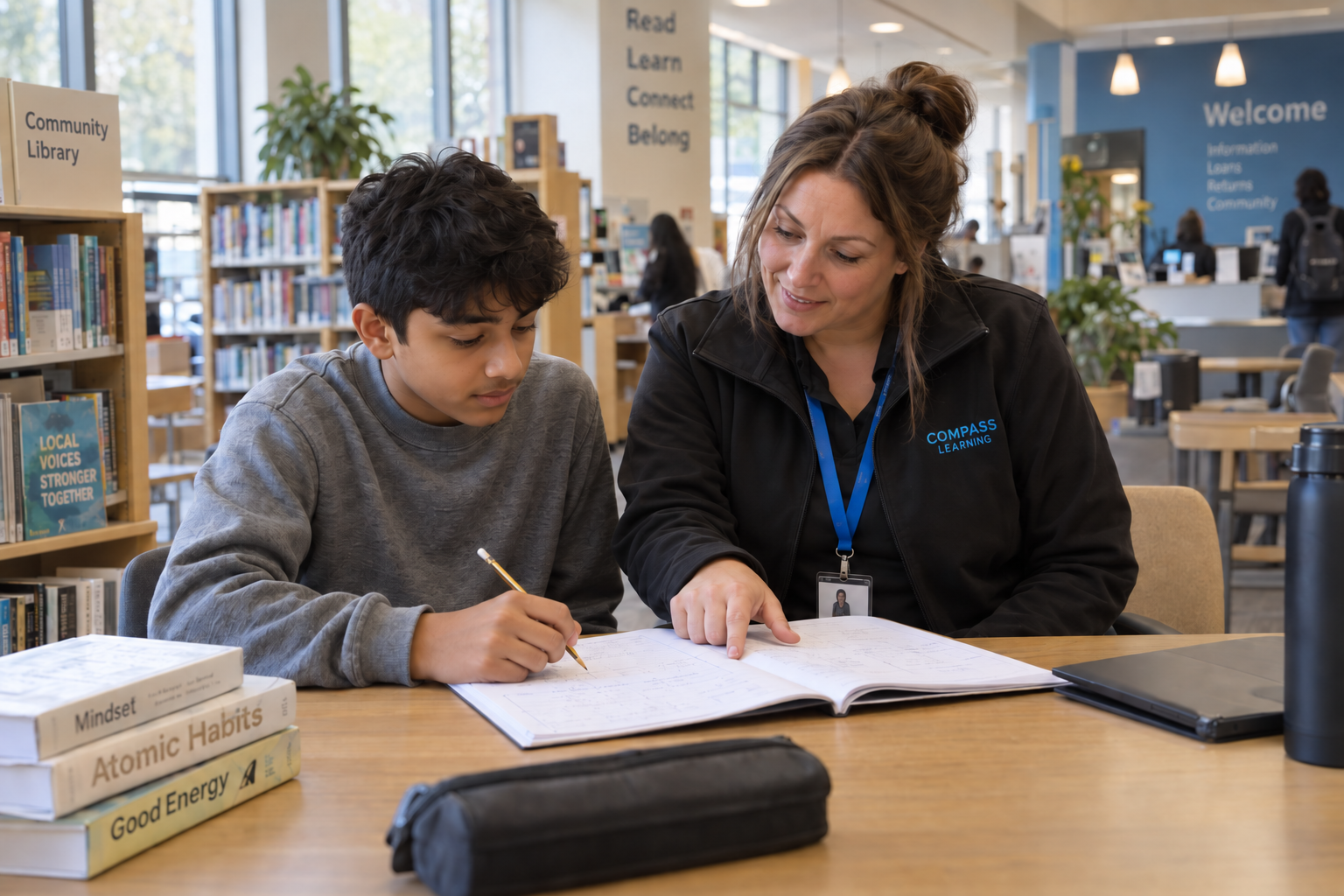 A young person being supported with their learning
